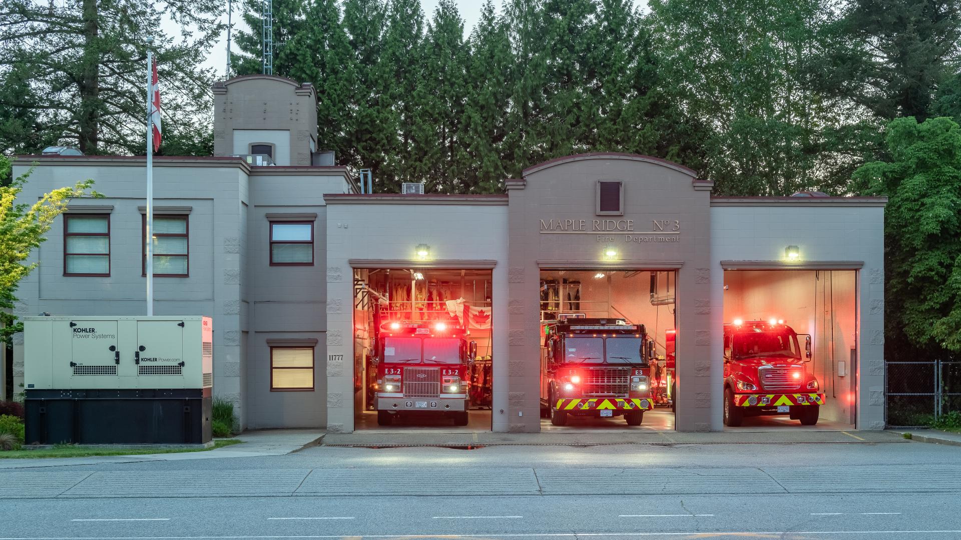 Fire Hall number 3 is a large brick building with three bays that house fire engines and office spaces.
