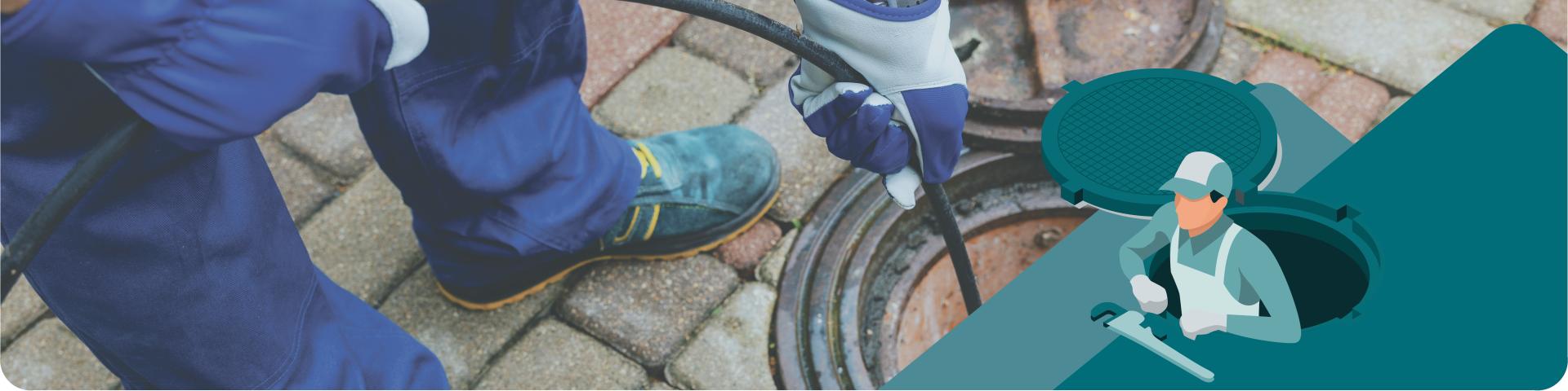 Sewer Open With Worker Holding A Hose