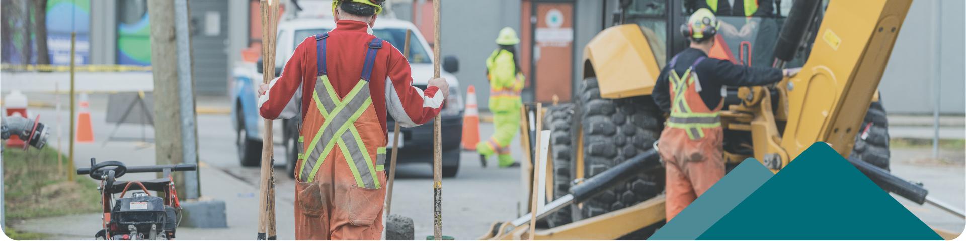 Construction Crew Working On Roads With Machinery 