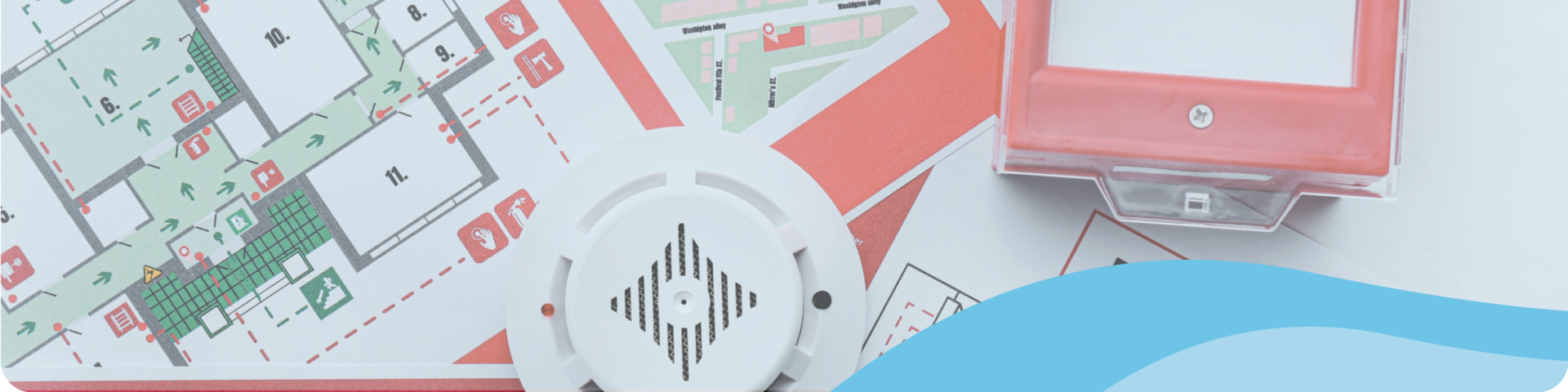 evacuation plan and fire alarm on the table