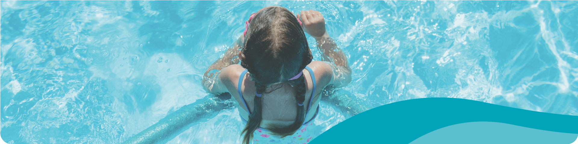 Young Girl Wading Through Hammond Outdoor Pool with a Pool Noodle