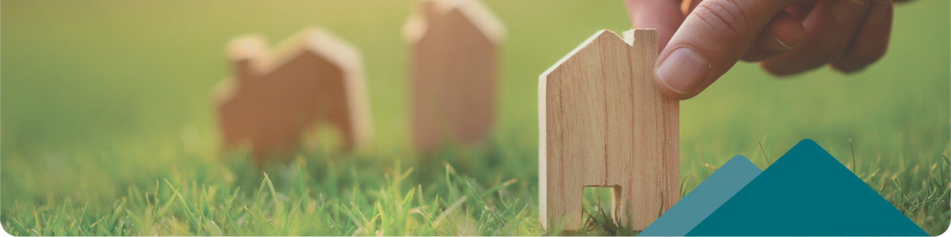 wooden houses on grass