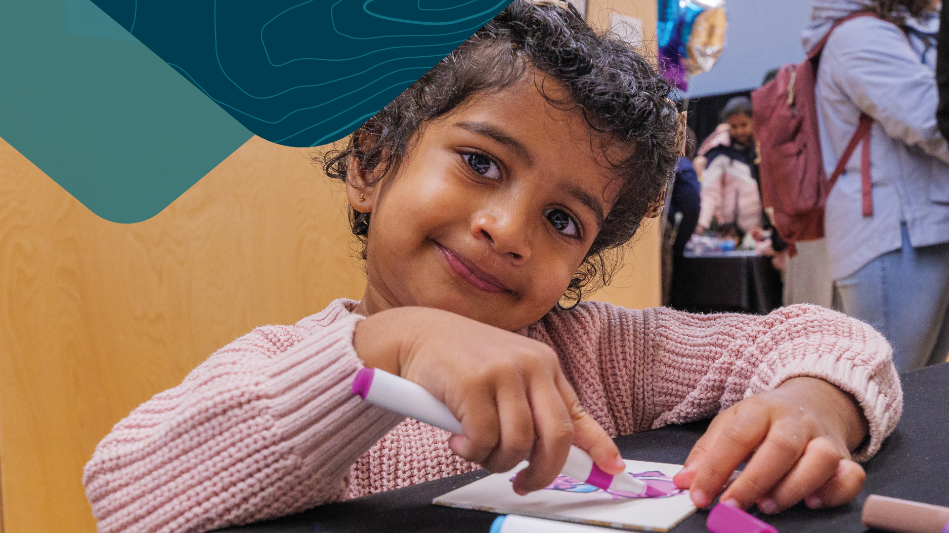 Young Girl Colouring at an event at Albion Community Centre